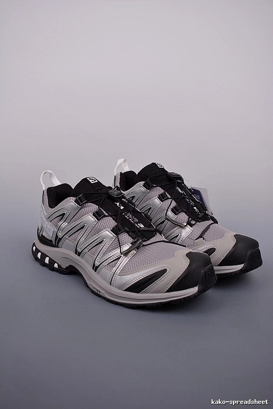 Salomon Gray and Black Trail Runners Highlighting Treaded Trail Sole